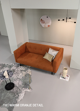 Trendhopper tip voeg warm oranje aardetint toe aan pastel interieur 